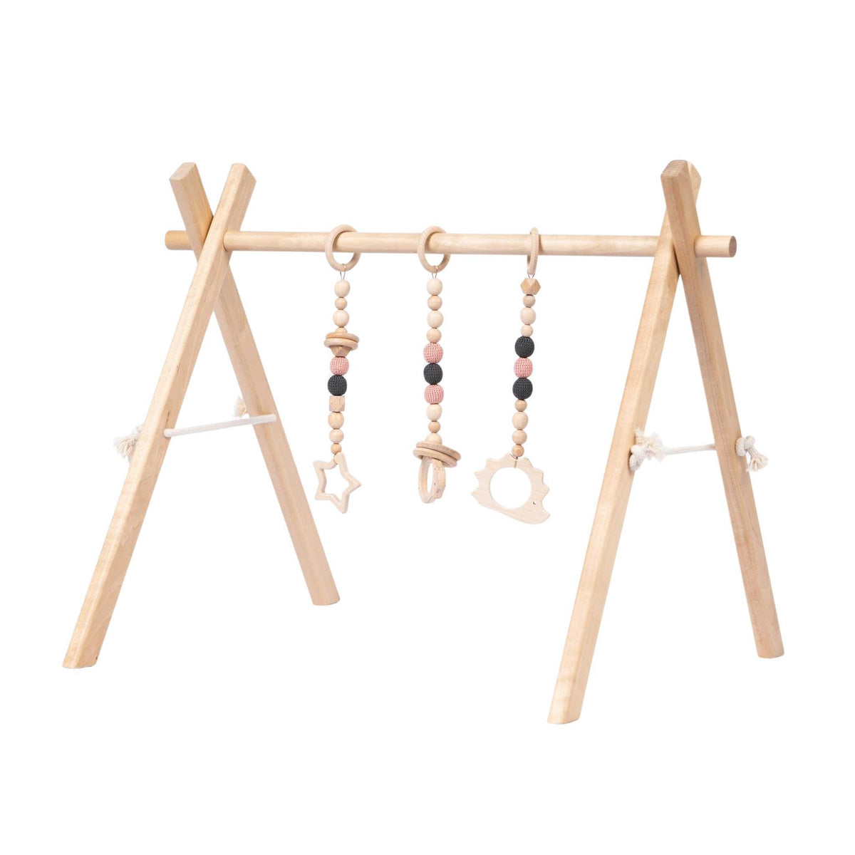Babygym i trä med rosa hängande leksaker från leg&go