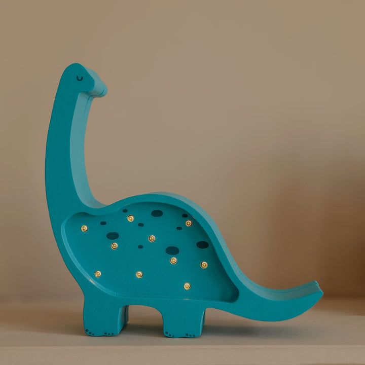 Mini Dino dinosaurielampa i trä från Little Lights