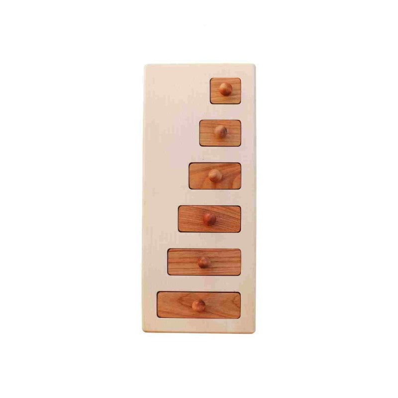 Träpussel från Wooden Story med träbitar i olika längder
