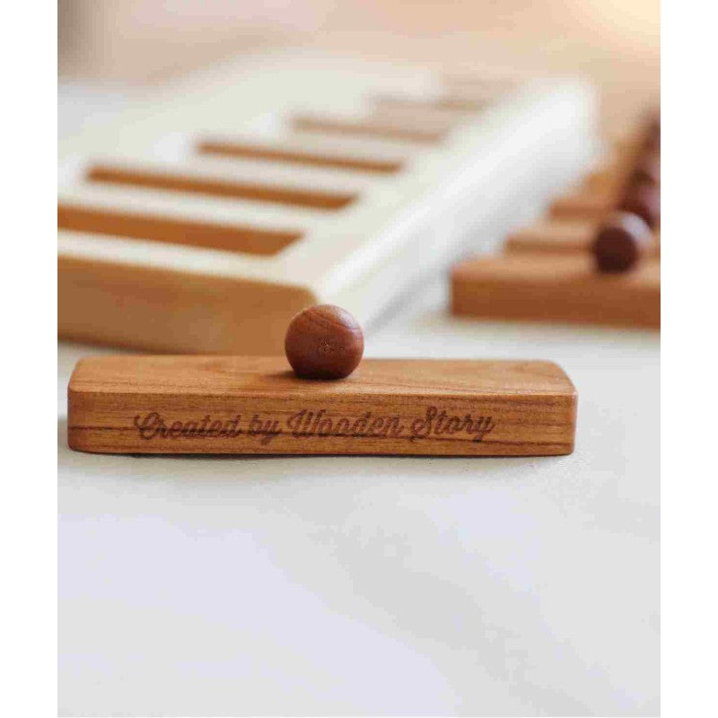 Träpussel från Wooden Story med träbitar i olika längder